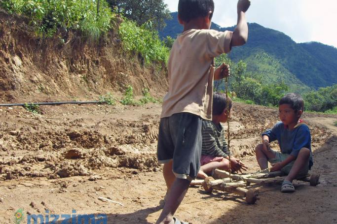 Chin children playing on a mountain road in Chin State. Photo: Ye Min/Mizzima

