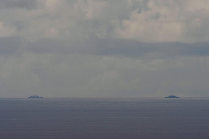 Two unidentified military vessels sail in waters near the east coast as seen from Yilan county on August 7, 2022. China's largest-ever military exercises surrounding Taiwan were drawing to a close on Agusut 7 following a controversial visit last week to the self-ruled island by US House Speaker Nancy Pelosi. Photo: Sam Yeh / AFP