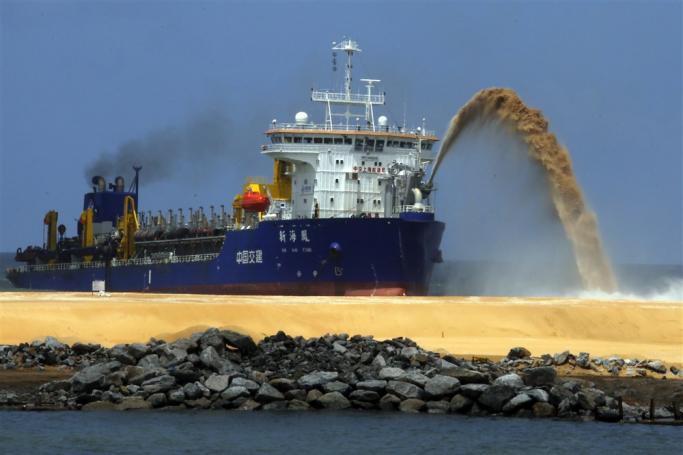 (File) Asia's largest sand dredger 'Jun Yang 1' belonging to China Harbour Engineering Company, pumps sand during the construction work of the Colombo Port City, now renamed Colombo Financial City, near Galle Face in Colombo, Sri Lanka, 02 October 2017. Photo: EPA