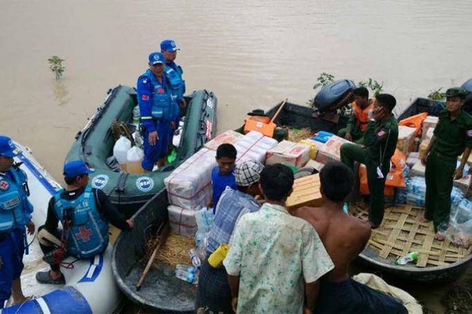 China's 'Blue Sky' rescue team sending aid to flood victims in the Ayeyarwaddy Region. Photo: china.com Myanmar
