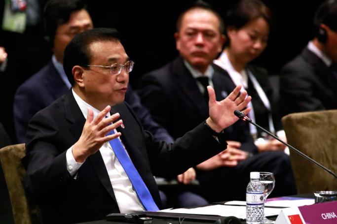 Chinese Premier Li Keqiang speaks during the 21st ASEAN Plus Three (APT) Summit at the 33rd Association of Southeast Asian Nations (ASEAN) Summit and Related meetings in Singapore, 15 November 2018. Photo: How Hwee Young/EPA