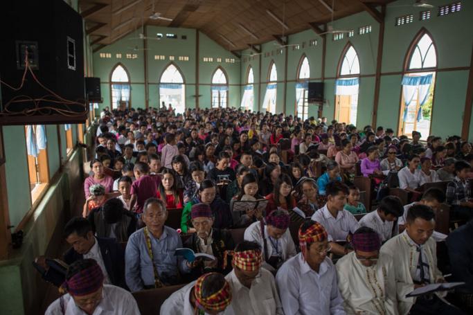 In this picture taken on May 13, 2018, internally displaced people and local villagers attend a church service in Myitkyina, Kachin state. Photo: Ye Aung Thu/AFP