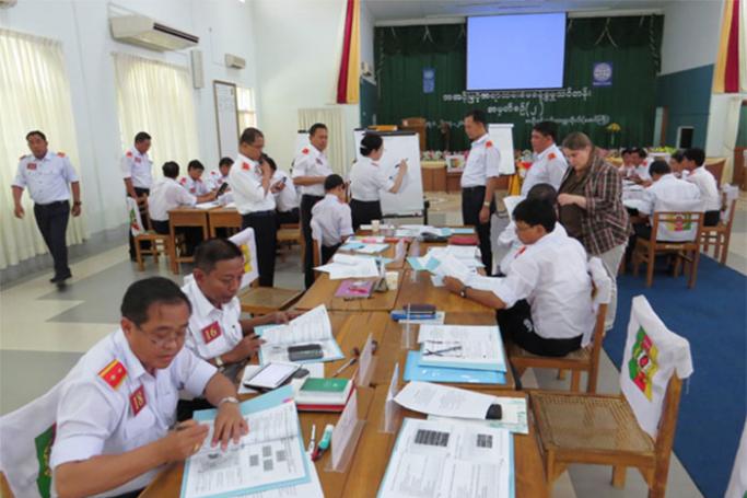 Civil service participants discuss different federal concepts during group work session in 2014. Photo: Hanns Seidel Foundation Myanmar

