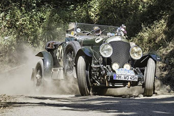 On the Road to Mandalay - A classic car hurtles along a dust road on the Singapore to Myanmar classic car enthusiasts' rally. Photo: Endurance Rally Association
