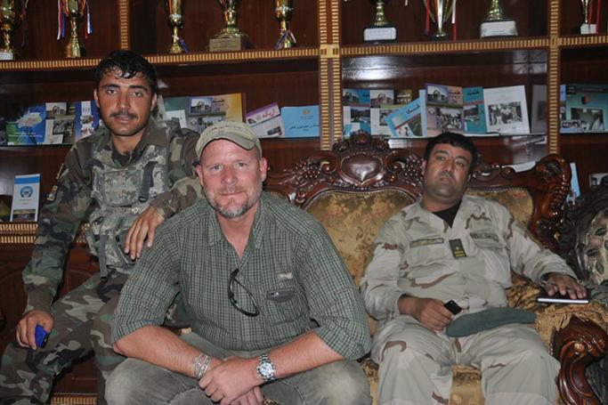 A picture made available on 06 June 2016 shows National Public Radio's reporter David Gilkey with Afghan Army soldiers in Afghanistan, 28 April 2009. US journalist David Gilkey and his Afghan interpreter Zabiullah Tamanna were killed in a rocket attack in Marjah, Helmand province on 05 June, while they were performing their professional duties. EPA/STR
