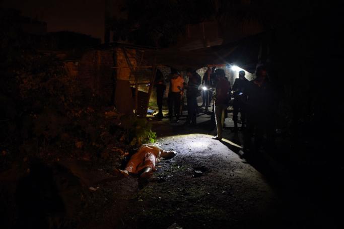 This photo taken on May 18, 2018 shows the dead bodies of Bangladeshi alleged drug dealers after a gun battle with law enforcement in Chittagong. Photo: AFP
