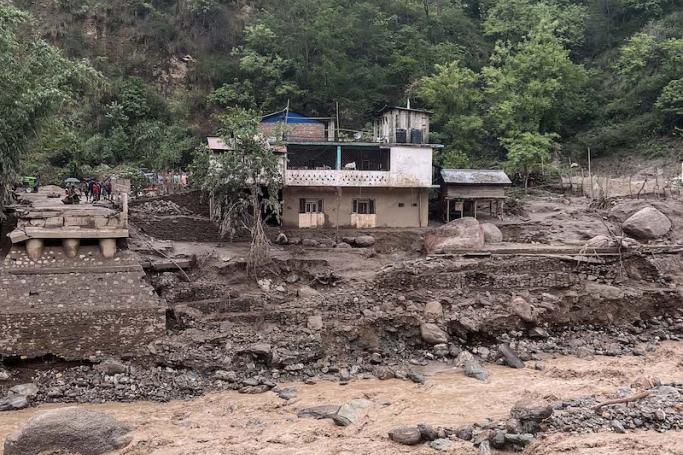 A general view of overflowing Hewa River after heavy rainfall in Panchthar on June 18, 2023. Photo: AFP