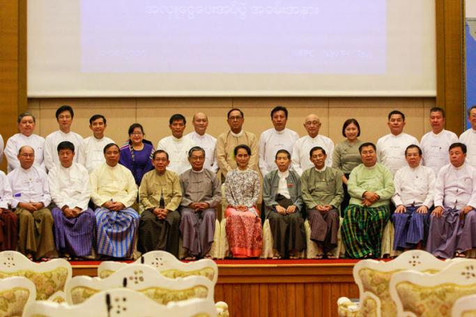 Myanmar's State Counselor Aung San Suu Kyi (C-sit), and Myanmar businessmen pose for photograph after during a donations ceremony for Union Enterprise for Humanitarian Assistance, Resettlement and Development in Rakhine State(UEHRD), at National Reconciliation and Peace Centre (NRPC) in Nay Pyi Taw on 20 October 2017. Photo: Min Min/Mizzima
