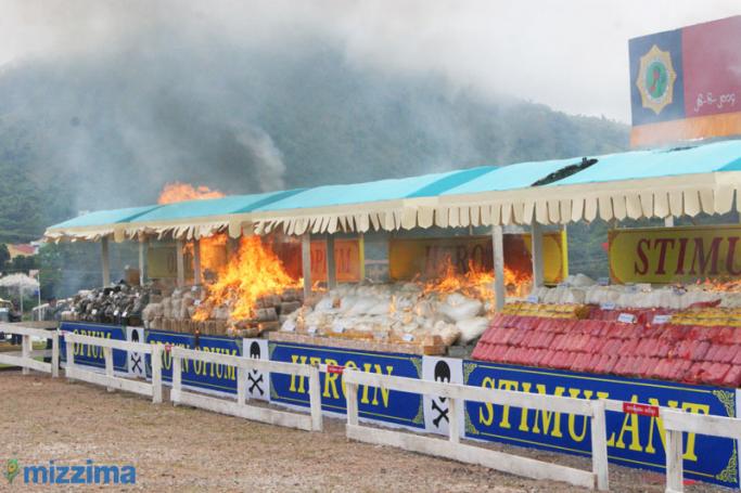 Burning illegal drugs during a 'Destruction Ceremony of Seized Narcotic Drugs, Precursors and Paraphernalia' to mark International Day against Drug Abuse in Taunggyi, Shan State, 2014. Photo: Mizzima
