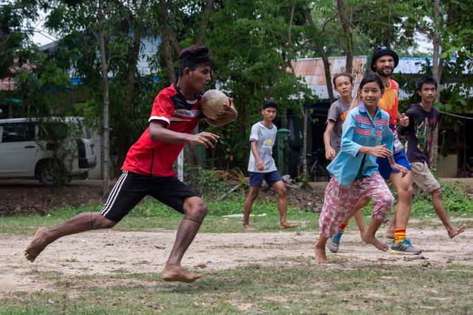 This picture taken on May 19, 2019 shows players from the Little Dragons rugby team taking part in a training session in the North Dagon township, located on the outskirts of Yangon. Photo: Sai Aung Main/AFP