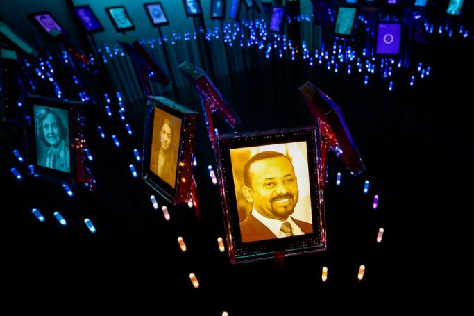 A picture of Ethiopian Prime Minister Abiy Ahmed (front) is displayed togethter with former Nobel Peace Prize winners at the Nobel Peace Center in Oslo, Norway, 11 October 2019. Ethiopia's Prime Minister Abiy Ahmed was awarded with the 2019 Nobel Peace Prize, the Norwegian Nobel Committee announced 11 October 2019. Photo: EPA-EFE