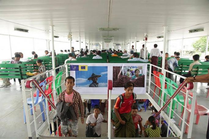 EU posters at Dala ferries. Photo: European Union in Myanmar via Facebook
