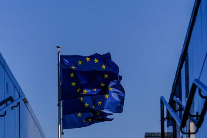 European flags flutter in front of the European Commission headquarters in Brussels, Belgium. Photo: Olivier Hoslet/EPA