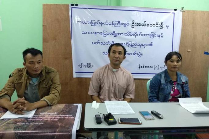 Father Richard Thura Tun of Loikaw Catholic Church and two local people at a press conference held in Yangon on November 8. Photo: Htike Nandar Win
