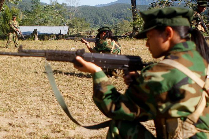 A picture made available on 20 November 2016 shows female soldiers of Kachin Independence Army (KIA) in action during the training session at a military camp near Laiza, Kachin State, northern Myanmar, 19 November 2016. Photo: Seng Mai/EPA
