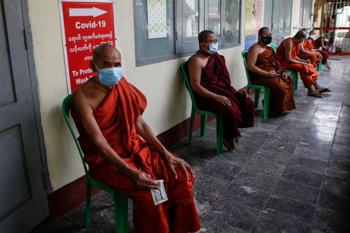 (File) uddhist monks wait for COVID-19 tests at the locked down Thayettaw monastery complex in Yangon, Myanmar, 30 October 2020. Photo: Lynn Bo Bo/EPA
