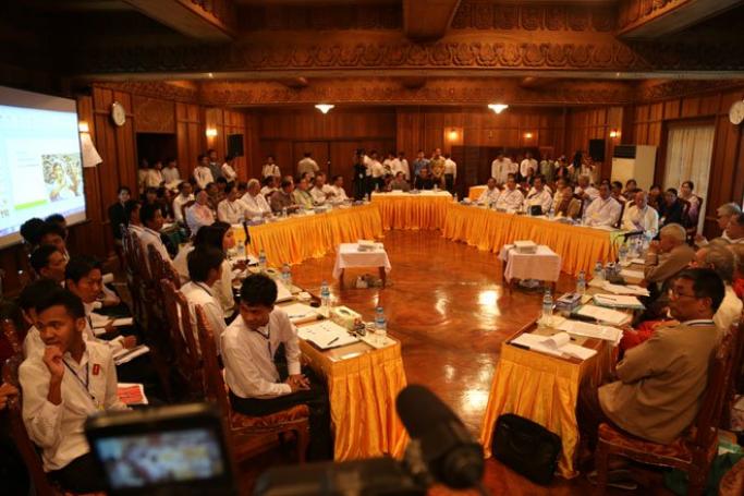 Upper House to discuss amendments to the controversial National Education Law. Four-party talks between the government, students, parliamentarians and the National Network for Education Reform over the National Education Law underway at Yangon Region Parliament headquarters on February 11, 2015. Photo: Min Min/Mizzima
