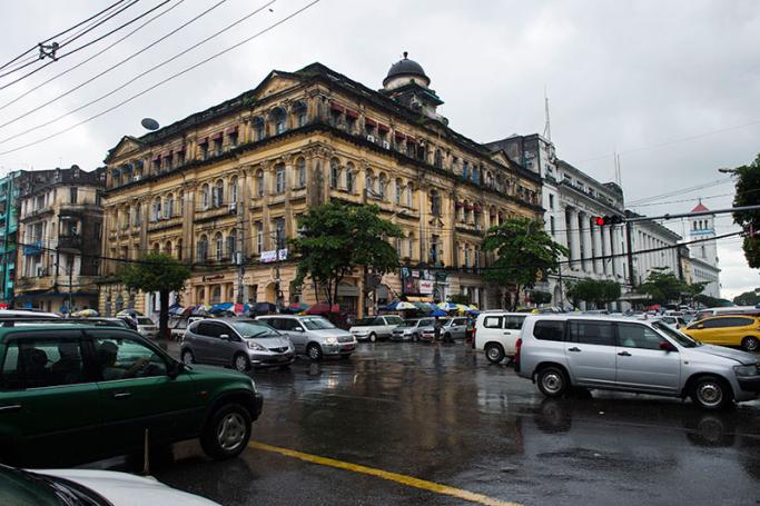 The Sofaer building (C) - constructed in 1906 by a wealthy Jewish trader - is pictured along Pansodan Road in Yangon with a row of grand colonial builidings, a cosmopolitan showcase and prestigious business address during the British colonial period. Photo: Romeo Gacad/AFP
