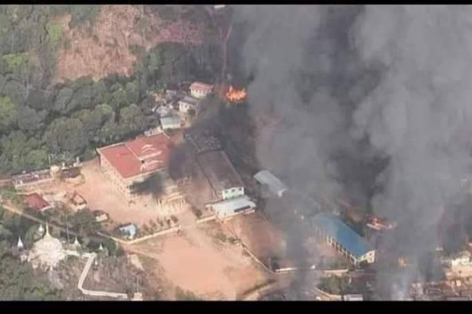 Houses burned by SAC troops in Nam Neang village.