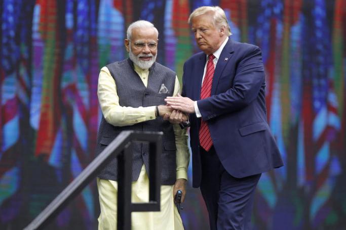 (File) Indian Prime Minister Narendra Modi (L) and US President Donald J. Trump speak to a crowd of over fifty thousand at the 'Howdy Modi' community summit at NRG Stadium in Houston, Texas, USA, 22 September 2019. Photo: EPA