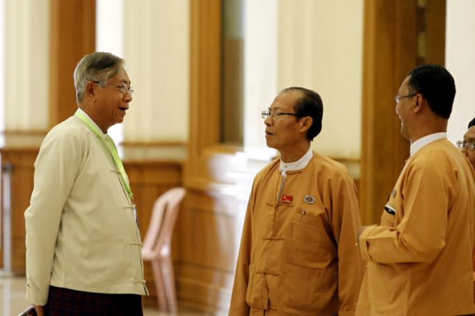 Htin Kyaw (L) nominated as president of Myanmar, a member of the National League for Democracy (NLD) party, at a parliament session of the lower house in Naypyitaw, Myanmar, 11 March 2016. Photo: Hein Htet/EPA
