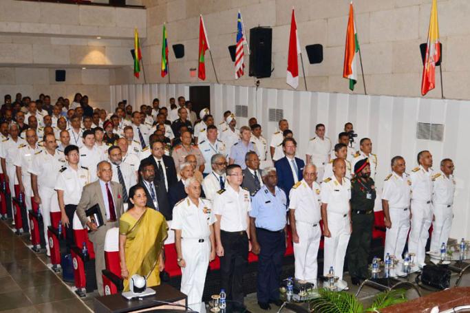 Press Information Bureau of India showing Nirmala Sitharaman (in yellow saree) at the inauguration of the Naval Conclave.
