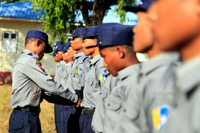 A senior officers inspects newly recruited members of the Myanmar Police Force standing in line as they take part in a training exercise in Sittwe, Rakhine State, western Myanmar, 15 November 2016. Photo: Nyunt Win/EPA
