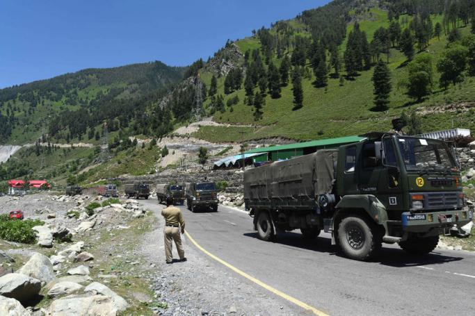 Indian army trucks travel along a highway leading to Ladakh, in Gagangeer, Ganderbal district, Jammu and Kashmir, India, 22 June 2020. Photo: EPA