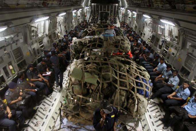 Indian aid - National Disaster Relief Force and IAF teams with relief material on their way to earthquake hit Nepal, April 27, 2015. Photo: EPA
