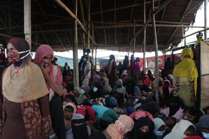 File) Rohingya refugees take rest after disembarking from a boat at Rancong Beach, Lhok Seumawe, North Aceh, Indonesia, 07 September 2020. Photo: EPA