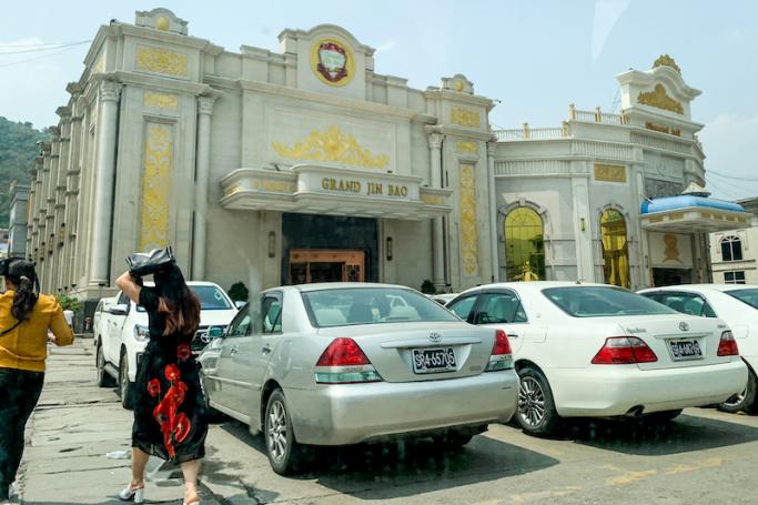(File) People walking past a casino near Mongla, Special Region Four, in eastern Shan State. Photo: AFP