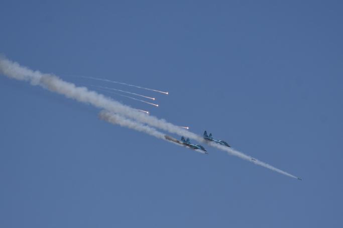Two Myanmar military jet fighters fire missiles during combined exercise by Myanmar army and air force near Magway on January 31, 2019.