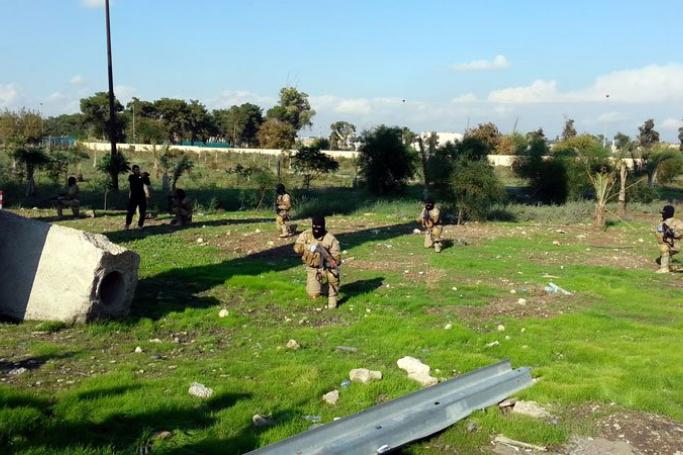 Fighters of the Islamic State terrorist group take part in a military training in Mosul city, northern Iraq, 02 November 2014. Photo: EPA