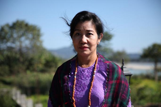 Ja Seng Hkawn at her riverside home in Myitkyina. (PHOTO:- Thin Lei Win/Myanmar Now) 

