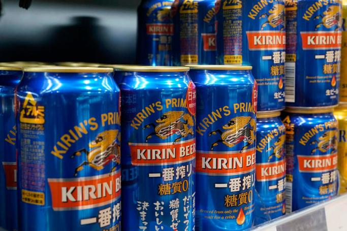 (File) Cans of Kirin Brewery beer are displayed at a liquor shop in Tokyo, Japan, 05 February 2021. Photo: EPA
