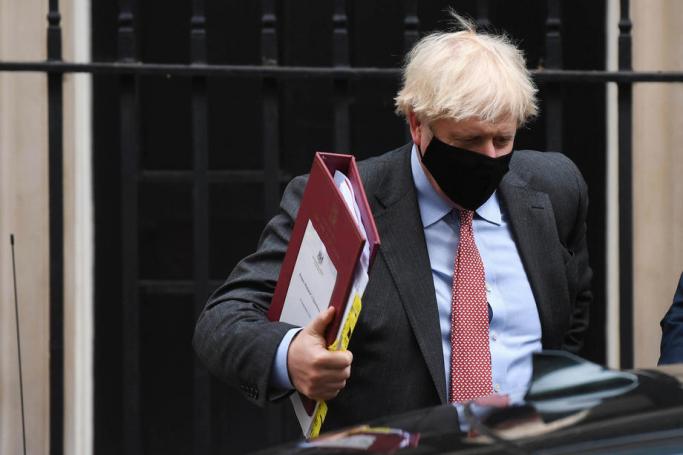Britain's Prime Minister Boris Johnson departs his official residence in Downing Street to attend weekly Prime Ministers Questions in parliament in London, Britain, 30 September 2020. Photo: EPA
