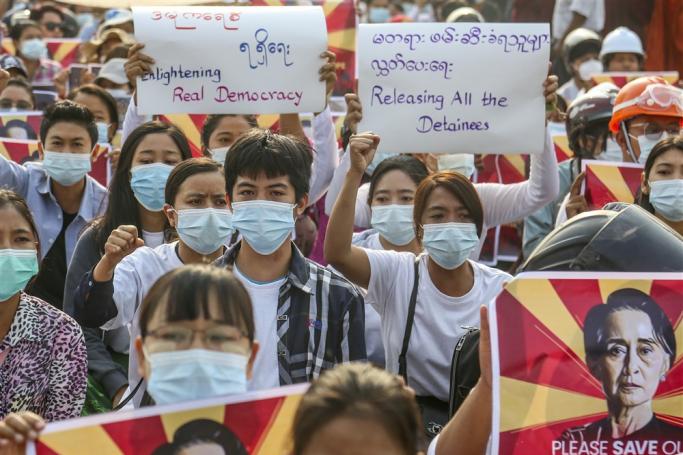 Demonstrators march during a protest against the military coup in Mandalay, Myanmar, 01 April 2021. Photo: EPA