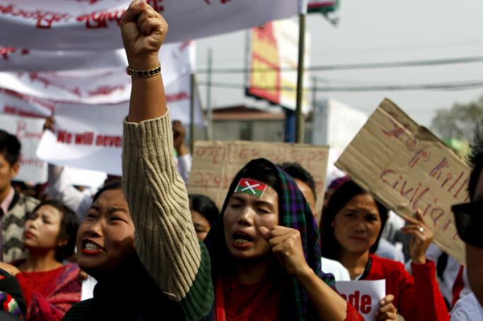 Kachin people hold placards and shout slogans during a rally in Myitkyina, Kachin State, Northern Myanmar, 05 February 2018. Si Thu MKN/EPA-EFE
