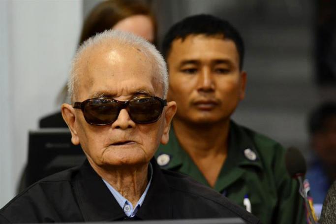 A handout picture made available by the Extraordinary Chambers in the Courts of Cambodia (ECCC) shows former Khmer Rouge Deputy Secretary of the Communist Party of Kampuchea Nuon Chea (L) in the courtroom at the ECCC in Phnom Penh, Cambodia, 23 November 2016. Photo: NHET SOK HENG/ECCC/EPA
