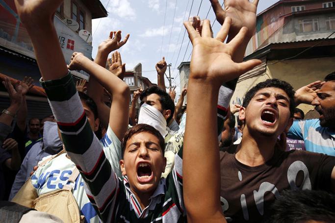 Kashmiri Muslims shout slogans during a protest against the recent killings in Kashmir's summer unrest, in Srinagar, the summer capital of Indian Kashmir, 11 August 2016. Photo: EPA
