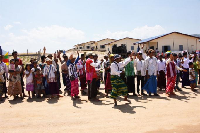Villagers welcome the guests with a traditional Karen dance in front of the completed houses in Lay Kay Kaw village, Karen State. Photo: Nippon Foundation

