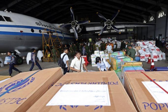 Aid being delivered for flood victims in Yangon, Myanmar, 6 August 2015.Photo: Nyein Chan Naign/EPA
