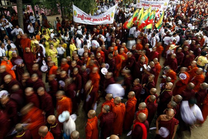 Myanmar Buddhist monks and supporters participate during a rally to mark the triumph of Nationality Protection Law in Mandalay, Myanmar, 21 September 2015. Photo: Hein Htet/EPA
