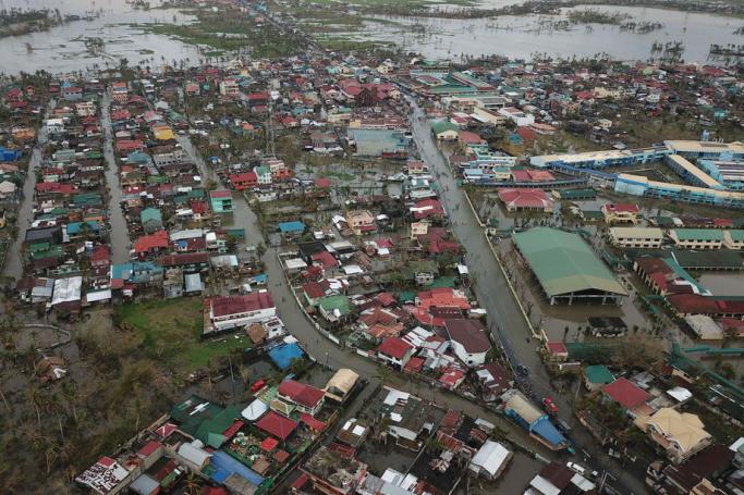 An image taken with a drone shows houses and buildings surrounded by flooded land in Camarines Sur province, Philippines, 12 November 2020. Photo: EPA