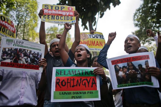 Rohingya protesters stage a demonstration outside the Myanmar Embassy to demand an end to discrimination against the Rohingya minority group in Kuala Lumpur, Malaysia, 21 May 2015. Community Action for Rohingya called for Myanmar's ambassador to Malaysia and embassy staff to leave the country over the migrant crisis. Meanwhile, Malaysia ordered its navy to conduct search-and-rescue operations to recover Rohingya migrant boats and bring them ashore. EPA/FAZRY ISMAIL
