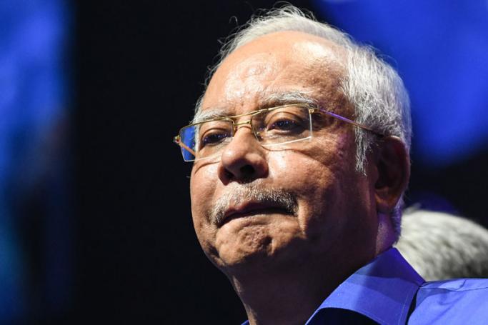 Asian countries trying to control the media? This picture taken on April 7, 2018 shows Malaysian Prime Minister Najib Razak singing his party's anthem before launching his coalition's election manifesto ahead of the upcoming polls during a National Front coalition or Barisan Nasional rally, in Kuala Lumpur. Photo: Mohd Rasfan/AFP
