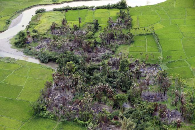 (File) An aerial view showing the burnt out village near Maungdaw township in Rakhine State, western Myanmar, 27 September 2017. Photo: Nyein Chan Naing/EPA
