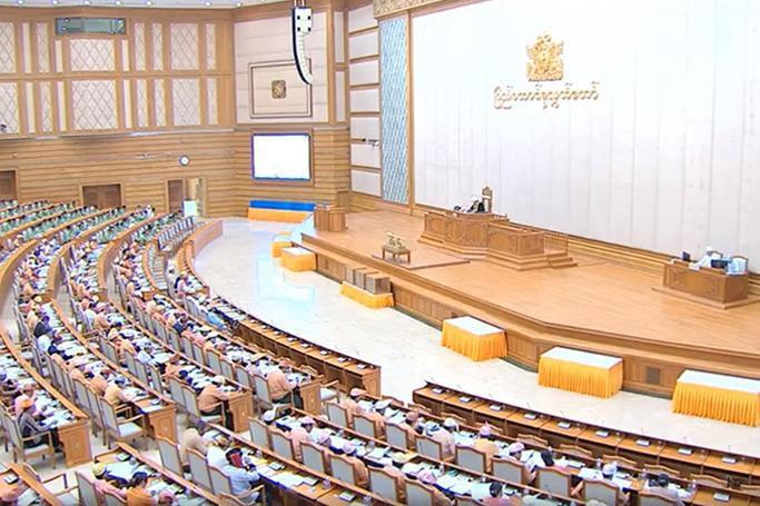 Members of Union Parliament attend a regular session of the Union Parliament in Nay Pyi Taw.