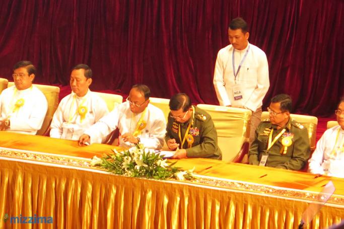 Senior General Min Aung Hlaing signs during the signing ceremony of the Nationwide Ceasefire Agreement (NCA)  at the Myanmar International Convention Centre (MICC) in Nay Pyi Taw on October 15, 2015. Photo: Theingi Tun/Mizzima
