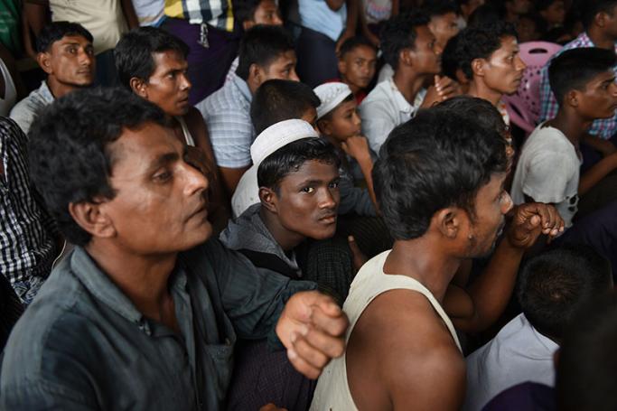 In this photograph taken on September 7, 2016, minority Muslim Rohingya men gather during a meeting with former UN secretary general Kofi Annan at the Thet Kal Pyin displacement camp in Sittwe, Rakhine State. Photo: AFP
